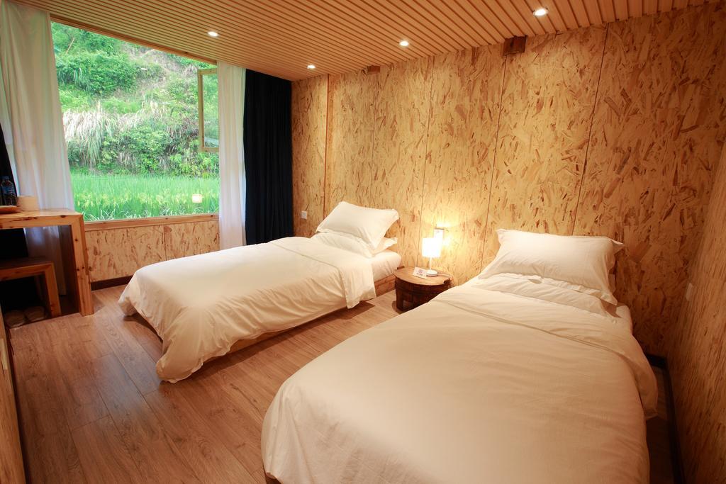 Tong Sang Art Hotel Liping Zimmer foto
